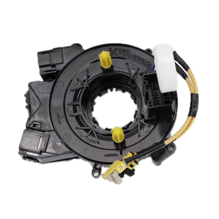 Steering wheel clock spring coil with central ring and multi-pin connector
