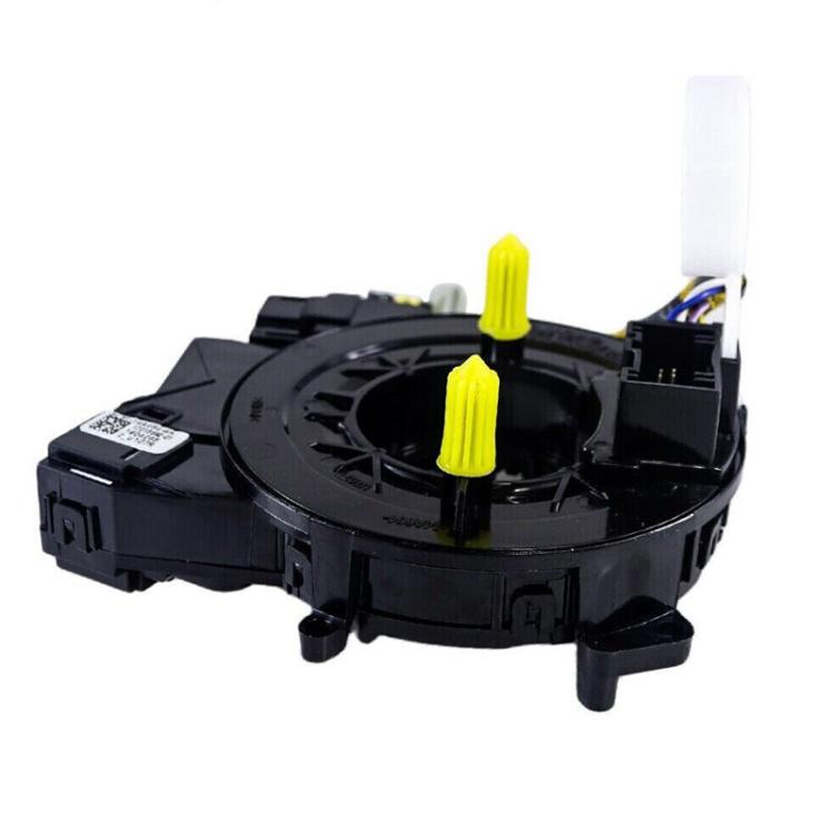 Black steering wheel clock spring coil with yellow mounting tabs and white connector