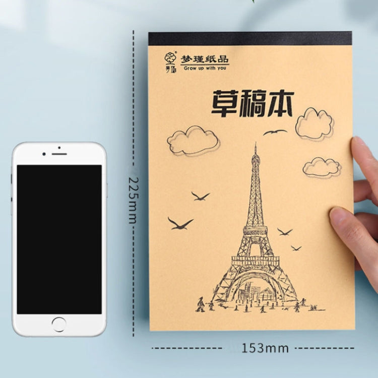 Beige sketch notebook with Eiffel Tower and cloud illustrations on the front cover, held
