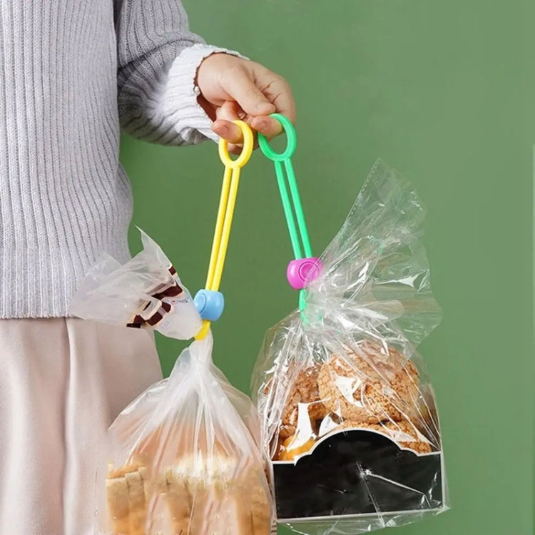 Green and yellow sealing tape clips holding plastic bags of food