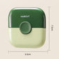 Green 2-in-1 hair clipper comb with round control button; compact size