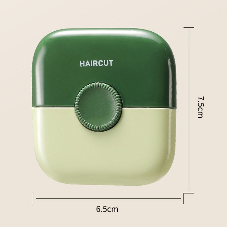 Green 2-in-1 hair clipper comb with round control button; compact size