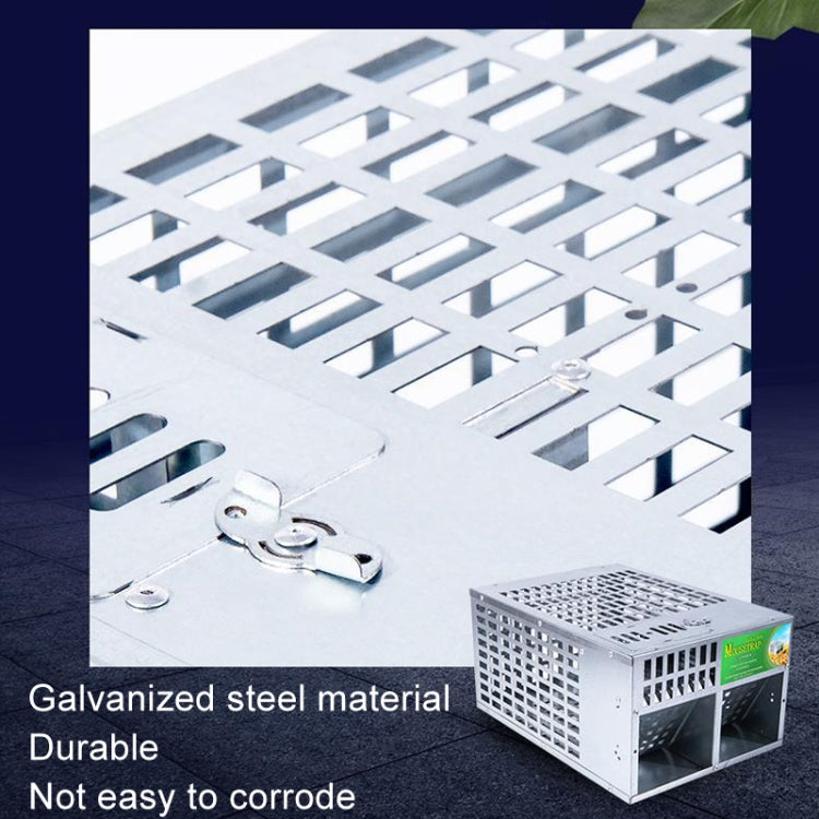 Close-up of metal mouse trap top grid and latch on a galvanized steel cage