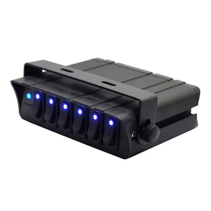 Black 6-switch panel controller with blue indicator LEDs and rotary knob