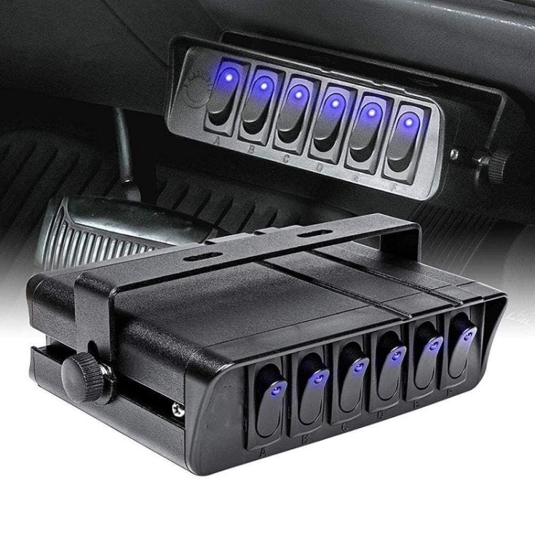 Compact black 6-switch controller with blue LEDs and ribbed mounting base