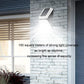 Wall-mounted solar street light with bright LED illumination on a light gray brick wall