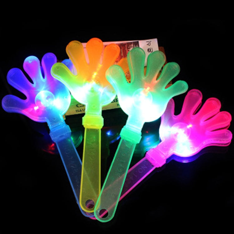 Glowing luminous slap clap hand flashers, multicolor LED hands lighting up in the dark