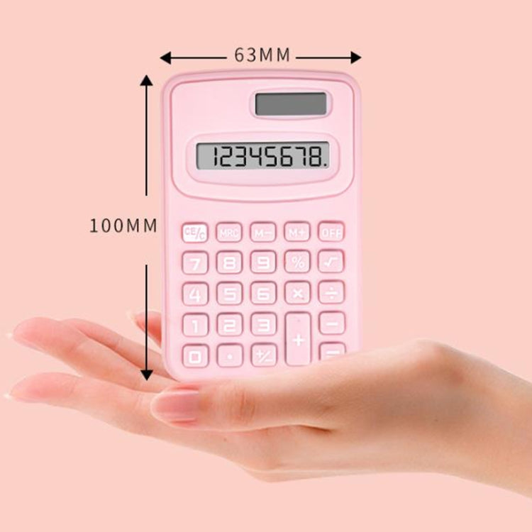 Pink small calculator shown next to size markings, with LCD display and keypad