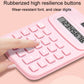 Pink calculator close-up with rubberized keys and LCD display window