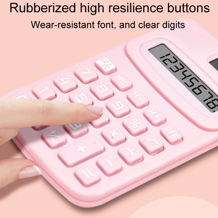 Pink calculator close-up with rubberized keys and LCD display window