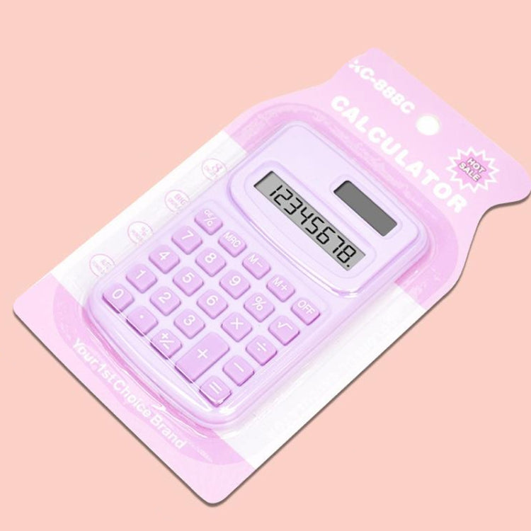 Purple small calculator in clear blister packaging with LCD display and keypad