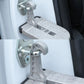 Silver foldable car foot pedal with safety hammer installed on car door