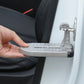 Hand lifting gray foldable car foot pedal with safety hammer on the door