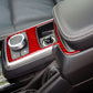 Red carbon-fiber cigarette lighter trim sticker around control area in console.
