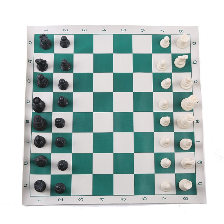 Foldable portable chess set board with scattered black and white chess pieces
