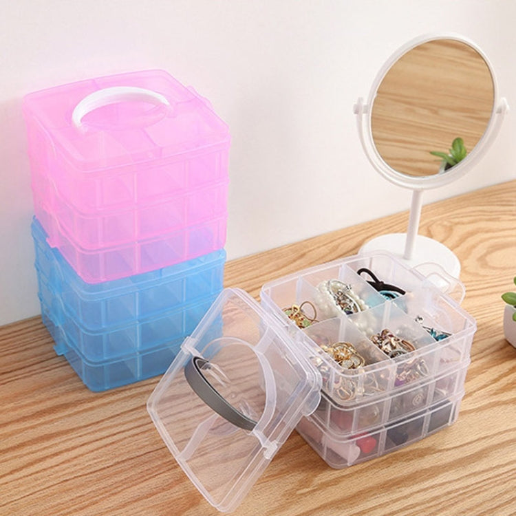 Stackable clear and pink jewelry organizer box with open compartments for accessories