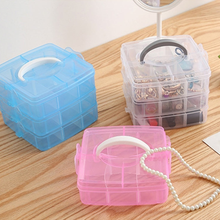 Set of stackable blue, clear, and pink jewelry storage boxes with carrying handles