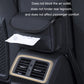 Black car seat organizer with tissue paper in front pocket on seat