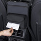 Black car seat tissue organizer with hand pulling tissue from front pocket