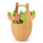 Beige wheat-fiber fruit fork set with colorful leaf-shaped picks in egg-shaped holder