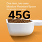 White drying scoop filled with brown granules in a white storage container