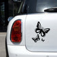 Black butterfly fuel cap decal sticker set on a light car surface