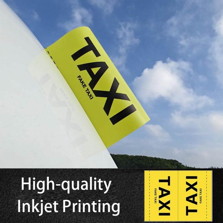 Yellow TAXI decal sticker with black 'FAKE TAXI', applied on windshield