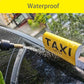 Yellow TAXI car decal sticker with black 'FAKE TAXI' on car windshield