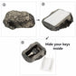 Step-style view of gray stone pine nut key box opening to reveal inner key slot