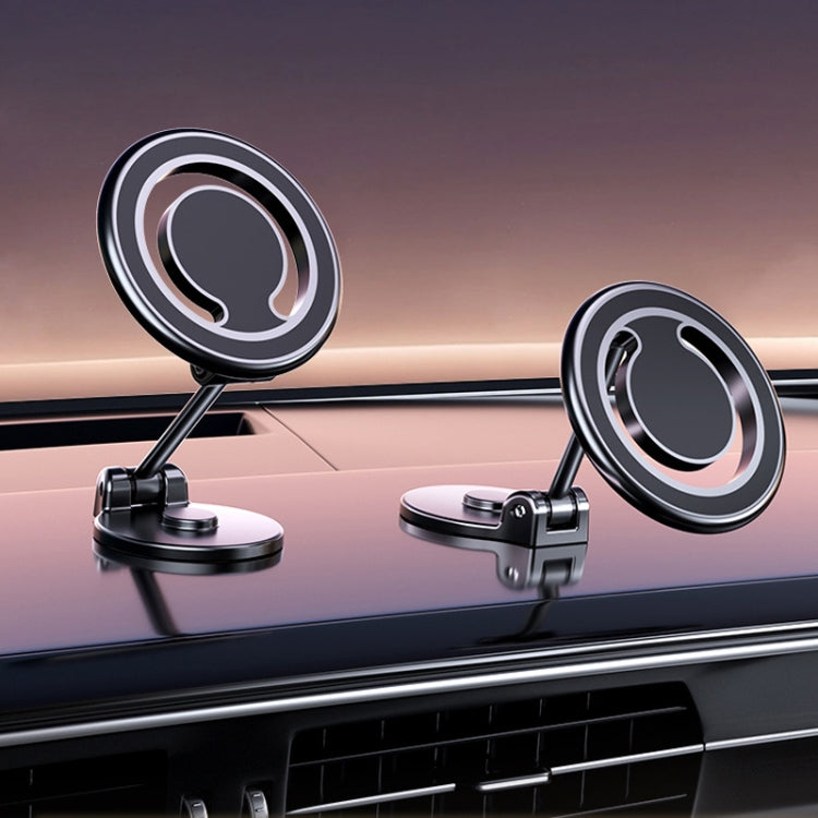 Black magnetic car phone holder clips to dashboard with rotating mount