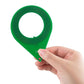 Green lock check ring tool held in hand with circular loop