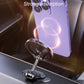 Magnetic phone holder with clamp base holding a smartphone on car dashboard