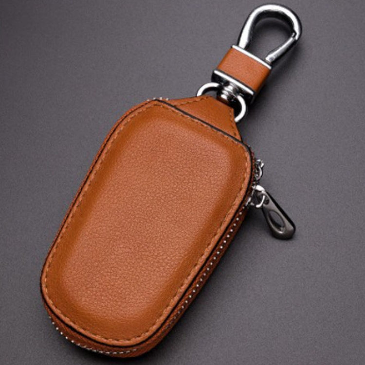 Brown leather key pouch with metal key ring and zipper closure
