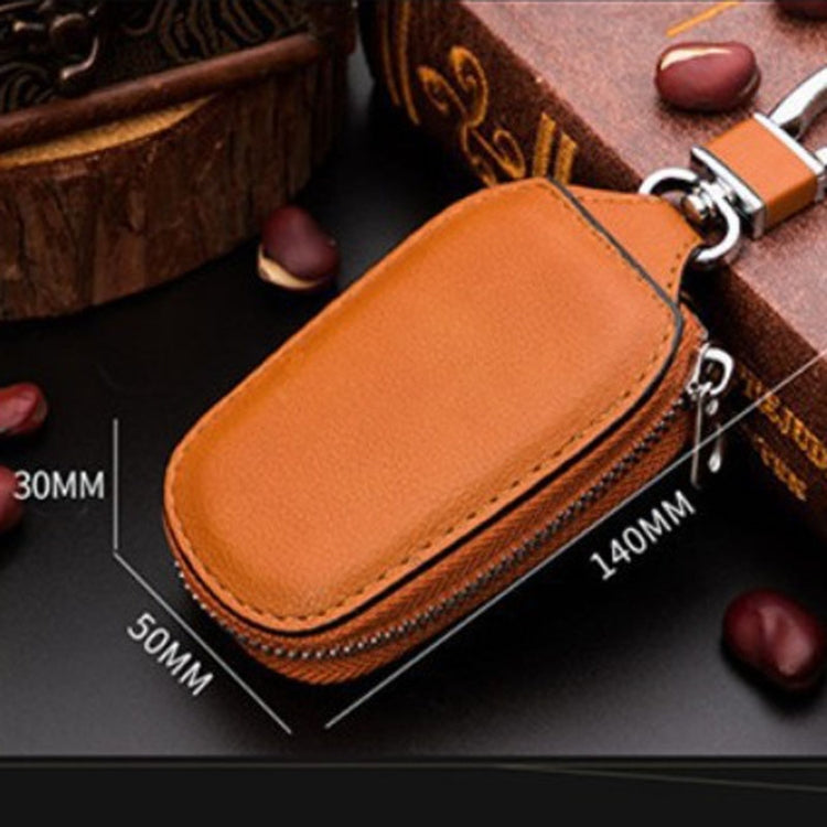 Orange leather key storage pouch with zipper and metal key ring