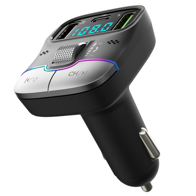 Black car charger audio player with LED display, metal mesh dial, and slim USB opening