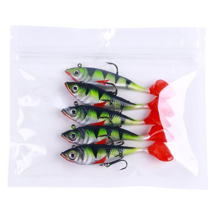 Five green-and-white swimbait lures with red tails in a clear plastic bag