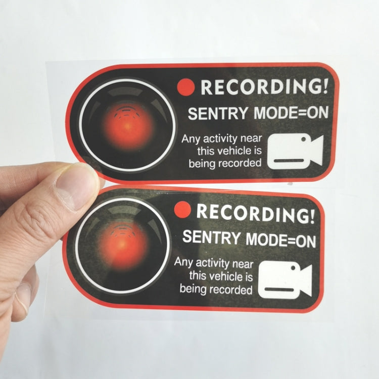 Recording! Sentry mode warning stickers held in hand, black with red border