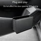 Black folding car seatback trash can hanging beside the front seat for storage