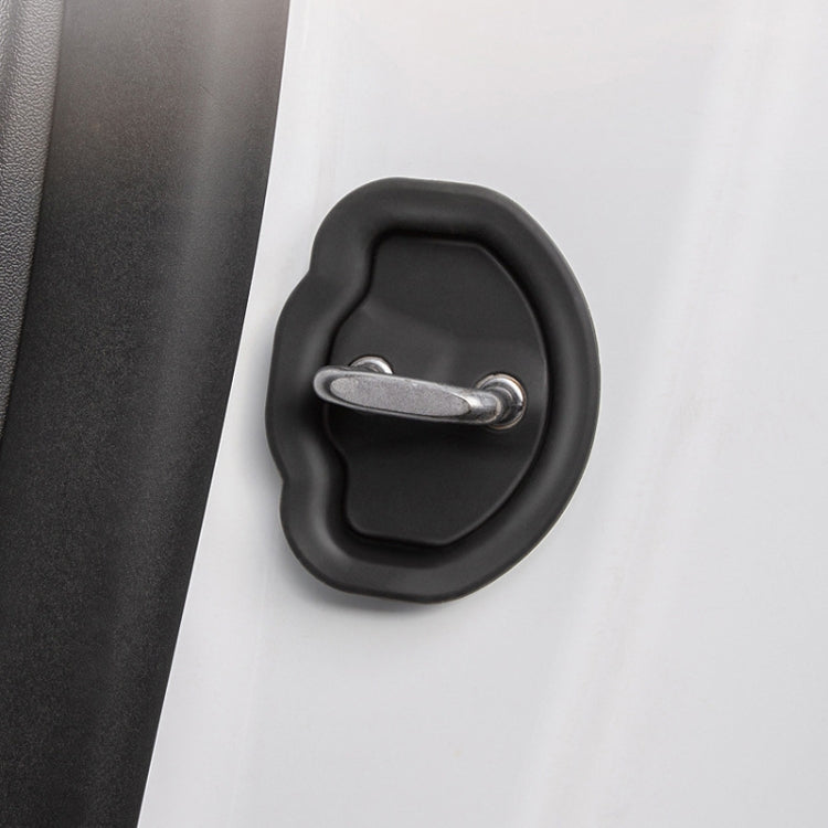 Black door latch cover clip with metal latch pin on car door