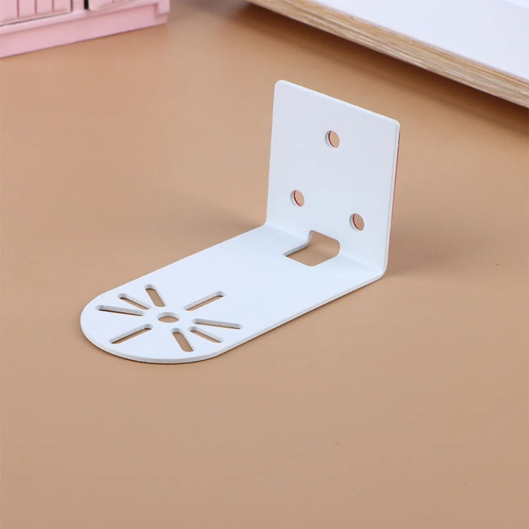 White wall-mount camera bracket with starburst cutout plate and mounting holes
