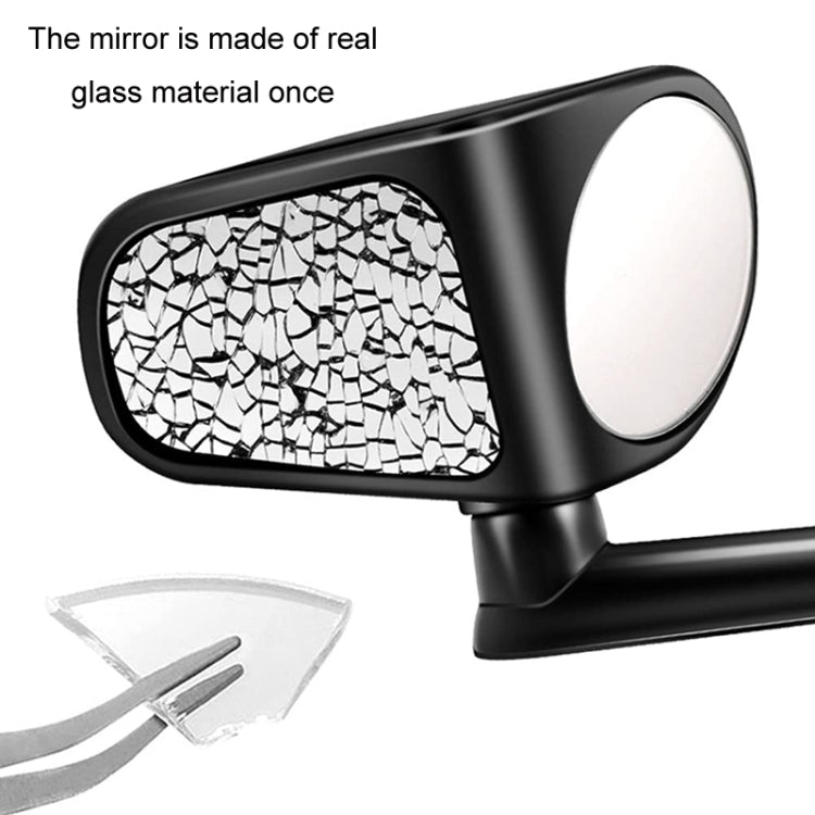 Black auxiliary rear view mirror with reflective glass insert on the left lens