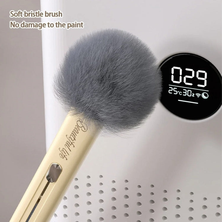 Cream handheld dust brush with large soft gray round bristle head