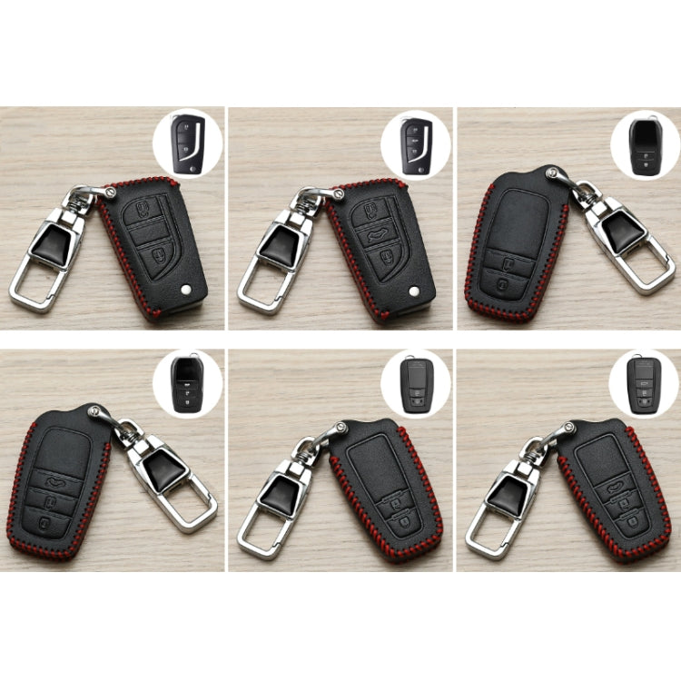 Set of black Toyota key fob covers with red stitching and metal keychain clips, multiple views