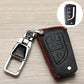 Black Toyota key fob cover with red stitched edges and embossed remote button icons