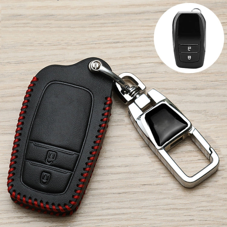 Black Toyota key fob cover with red stitching, metal clip and key ring, side view