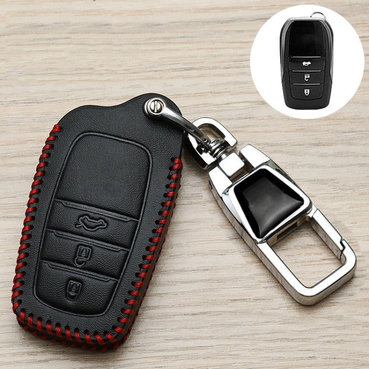 Black Toyota key fob cover with red stitching and metal keychain clip, side detail