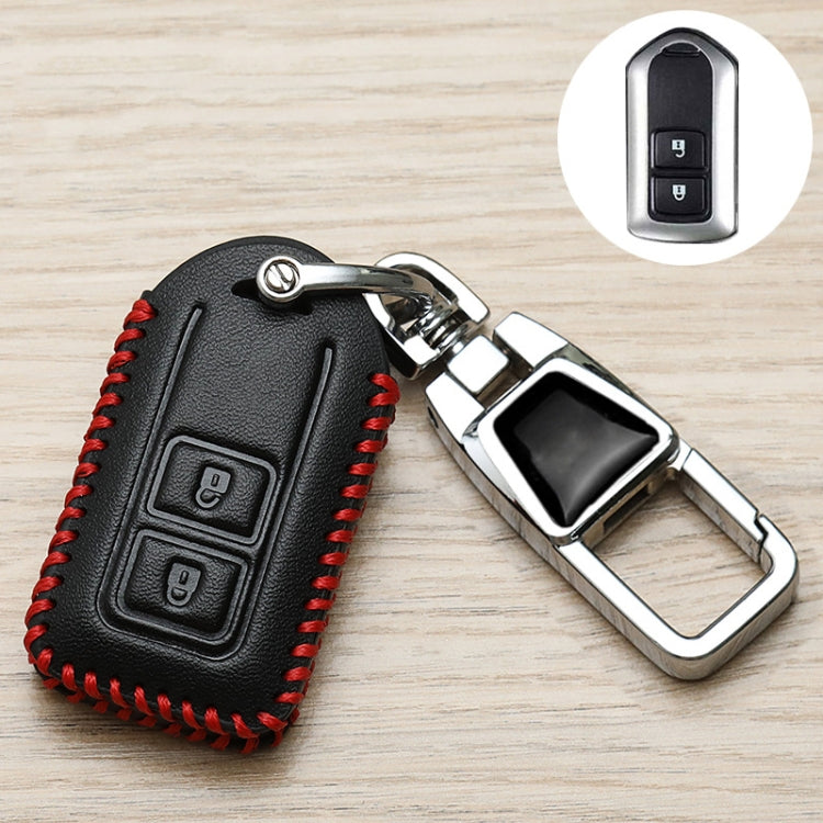 Black Toyota key fob cover with red stitching and metal clip, back side with icons