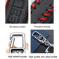 Black key fob cover close-up with red stitched edges and button icons