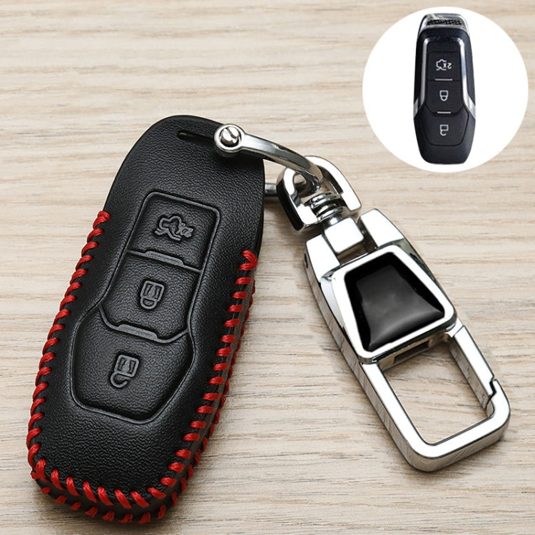 Black leather-style car key cover with red stitching, metal keyring and chrome holder
