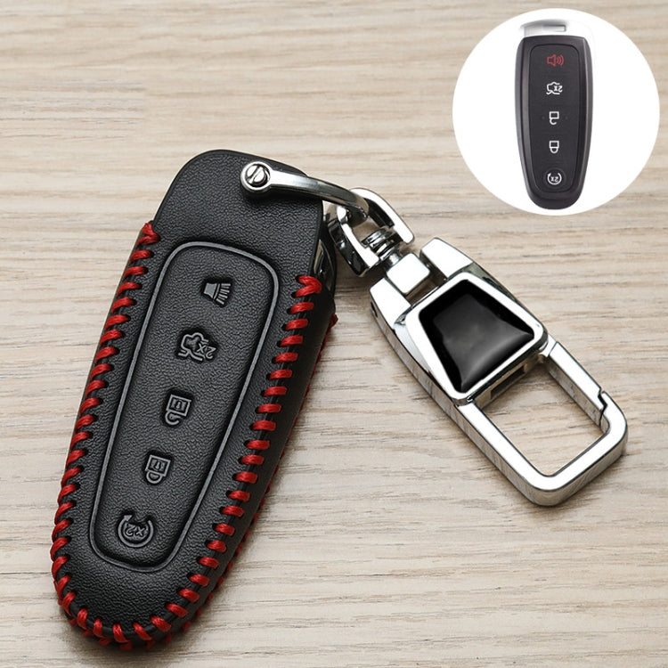 Black key fob cover with red stitching and metal keyring, remote buttons visible